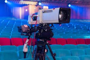 A professional television camera for filming concerts and events photo