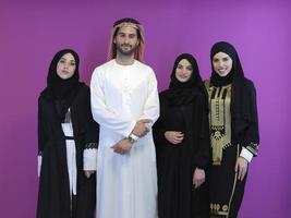 Portrait of young muslim people in traditional clothes photo