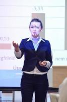 business woman giving presentation photo