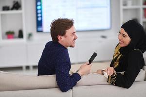 Young muslim couple enjoing time together at home during Ramadan photo