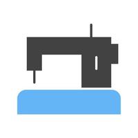 máquina de coser glifo icono azul y negro vector