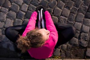 woman  stretching before morning jogging photo