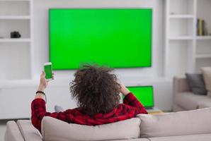 young man in bathrobe enjoying free time photo