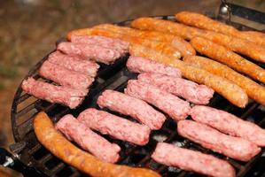 sausages on grill photo