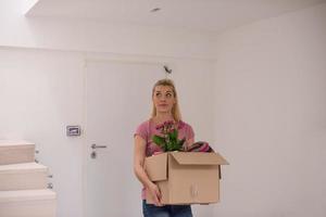 girl moving in the new apartment photo