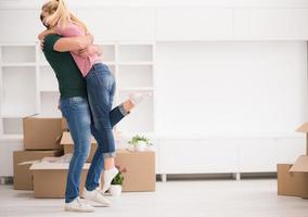 happy Young couple moving in new house photo