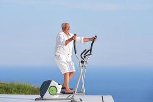 healthy senior man working out photo