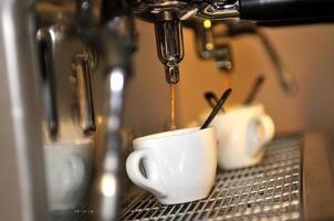 Espresso being poured photo