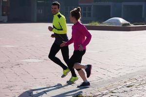 young  couple jogging photo