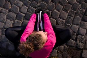 woman  stretching before morning jogging photo