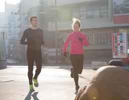 young  couple jogging photo