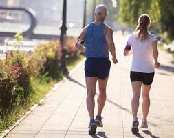 Couple jogging outside photo