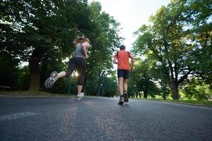 couple jogging outside photo