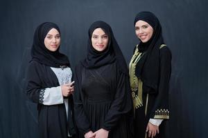 Portrait of Arab women wearing traditional clothes or abaya photo