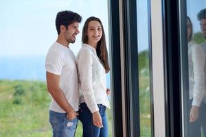 relaxed young couple at home staircase photo