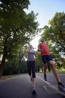 couple jogging outside photo