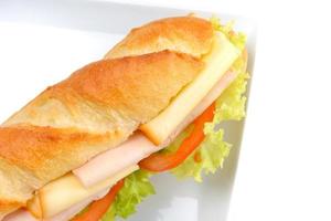 sandwich on a white surface photo