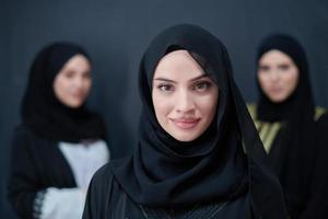 Portrait of Arab women wearing traditional clothes or abaya photo
