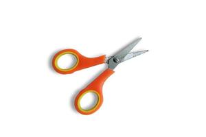 orange aluminum scissors top view on plain background photo