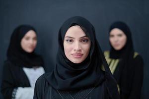 Portrait of Arab women wearing traditional clothes or abaya photo