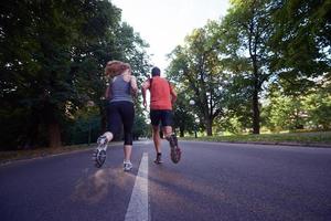 couple jogging outside photo