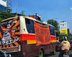 Jakarta soccer supporters are mobilizing themselves to the stadium. photo