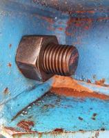 Close up photo of bolt and nut connection that joins steel plate for launcher gantry.