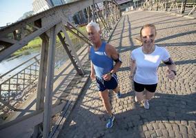 Couple jogging outside photo