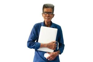 Asian old man holding a laptop smiling in a white background photo