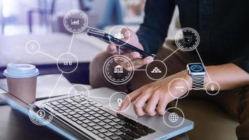 Searching Browsing Internet Data Information Networking Concept with blank search bar.businessman working with mobile phone and laptop computer VR icon photo