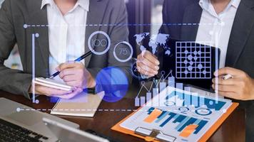 Data Management System with Business Analytics concept. business team hands working with provide information for Key Performance Indicators and marketing analysis photo