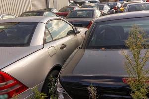 old cars in a junkyard photo