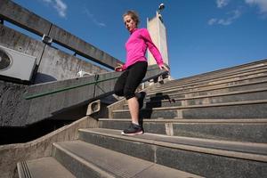 woman jogging on  steps photo