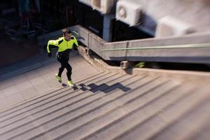 man jogging on stairs photo