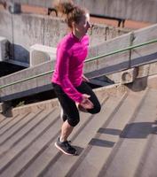 woman jogging on  steps photo