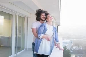 Couple hugging on the balcony photo