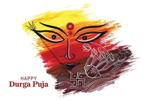 Beautiful brush stroke durga face on durga puja festival card background