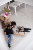 African American couple  playing with packing material photo