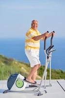 healthy senior man working out photo