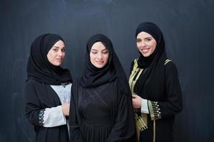 Portrait of Arab women wearing traditional clothes or abaya photo