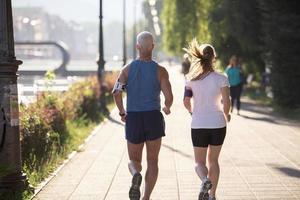 Couple jogging outside photo