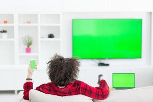 young man in bathrobe enjoying free time photo