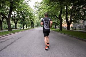 male runner training for marathon photo