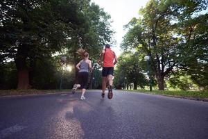 couple jogging outside photo