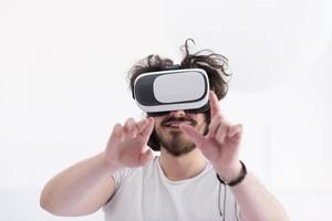 Man using headset of virtual reality photo