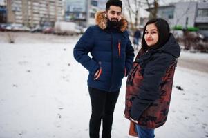 Indian couple wear jacket in cold winter day. photo