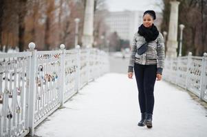 African woman wear in black scarf pose in winter day at Europe. photo