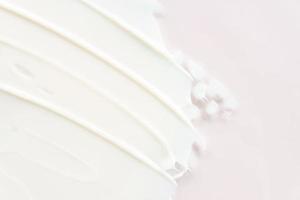 Cream lotion texture. White moisturizer, skincare cosmetic product smear background. Space for text. photo