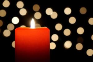 christmas candle with bokeh background photo