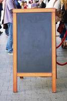 blank blackboard advertising sign or customer stopper photo